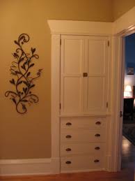Featuring design elements such as a distressed finish, decorative doors, and an egg and dart molding along the top and bottom, your bathroom. Diy Storage Cabinet With Doors Novocom Top