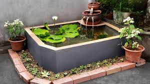 Aquariums Build A Simple Garden Waterfall Aquarium For Your Family Small Garden Waterfalls Garden Waterfall Backyard Water Feature