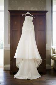 Wedding Dress Hanging Up With Wardrobe Dresses Wedding Dresses Reportage Wedding Photography