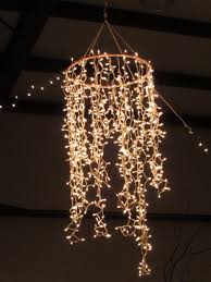 Christmas branches with fairy lights from vanchitecture. Light The Way Fairy Lights Decor Diy Chandelier Hula Hoop Chandelier