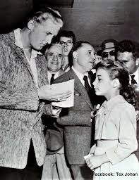 1958, May 26, London. Autograph for a fan. Man to right is Oscar Davis (thnx Graham Knight) By the end of 1957 he was managing Jerry Lee until Nov of 1958, then