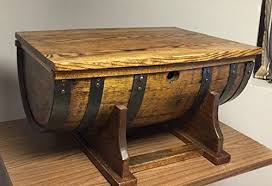 A coffee table is an essential touch for any living space, and if you're being boxed out by tiers of square furniture, a circular table like this one might be just the thing to break up the expectations of your space while still delivering surprising surface area. Robot Check Whiskey Barrel Coffee Table Barrel Coffee Table Coffee Table