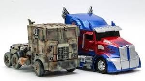 Optimus prime was created, along with ultra magnus, by alpha trion during the golden age.the two of them were raised together, and thus, saw each other as brothers. Transformers Movie 4 5 Repaint Evasion Optimus Prime Night Optimus Prime Truck Car Robot Toys Youtube