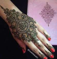The large round serves as the base around which several designs are made. Back Hand Patch Mehndi Designs For Hands Henna Tattoo Designs Full Hand Mehndi Designs