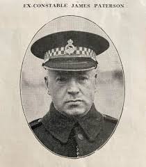 Patsy Purcell, night captain police force ~ August 20, 1901 ~ Oscar  Grossheim portrait of Patrick "Patsy" Purcell in his police uniform. He has  his cap in his left hand which is