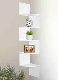 Most corner shelving units are made out of wood and come in many wood styles and colors , but if you are looking for something a little different and love the look and power inherent in wrought iron , then maybe this is just the corner shelf for you. Greenco 5 Tier Wall Mount Corner Shelves White Finish Amazon In Furniture