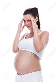 La Mujer Embarazada Que Tiene Dolor De Cabeza Dolores Del Embarazo Y Depresion Fotos Retratos Imagenes Y Fotografia De Archivo Libres De Derecho Image 16860915