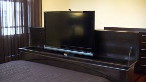 Mount the brackets to your flat screen tv download article. Tv Lift Foot Board Youtube Tv Lift Cabinet Vinyl Flooring Kitchen Fireplace Entertainment Center