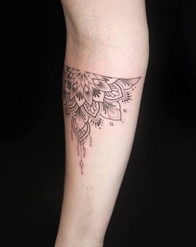 Ornamental floral mandala by Spencer. Symmetrical blackwork wrapping the forearm with layered petal construction and smooth dotwork gradients for controlled depth. 🔥 DM to book. #tattoo #bangkoktattoo #thailandtattoo #geometrictattoo #mandalatattoo ...