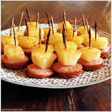 Mix together chili sauce, jelly, cinnamon, nutmeg, ginger, wine, mustard and soy sauce in a saucepan or chafing dish until mixture can be smoothly blended. Glazed Pineapple Kielbasa Bites