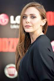 And on sunday evening elizabeth olsen looked every inch the leading lady as she attended the premiere of godzilla at london's leicester square. Elizabeth Olsen Godzilla La Premiere Red Carpet Fashion Awards Elizabeth Olsen Elizabeth Olsen Scarlet Witch Olsen