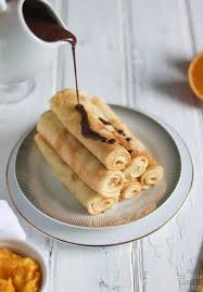 Les Crepes Roulees Orange Et Chocolat Recette Alimentation Chocolat Decorations De Gateaux
