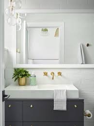 white vessel sink on dark gray bath