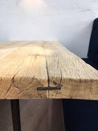 This driftwood project is a little bit more forgiving than the starburst mirror if you don't have an artistic eye. Driftwood Table Top By Craft B Seen At 601 Queen S Rd London Wescover