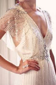 A Bold Beaded Art Deco Wedding Dress With A Plunging Neckline And Flowy Sheer Sleeves Wedding Dresses Jenny Packham Bridal Wedding Dresses Vintage