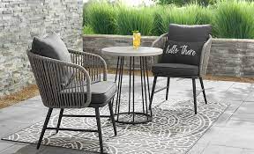 Patio coffee tables (24) patio dining tables (40) patio end tables (15) patio folding tables (2) patio table bases (4) patio table tops (3) picnic tables (5) frame material. A Small Patio Featuring A Wooden 3 Piece Bistro Set Small Patio Table Apartment Patio Furniture Small Patio Table And Chairs