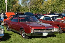 Image result for Riviera Red 1966 Buick