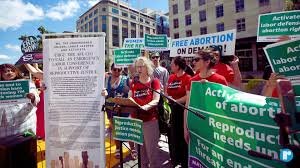 No work, no school, no spending: why women and labor unions are demanding  action post-Dobbs