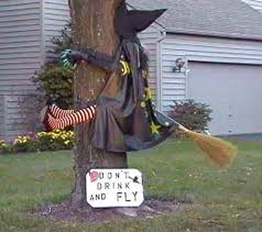 A Funny Halloween Picture Of A Witch Who Has Crashed Into A Tree While Flying On He Funny Halloween Decorations Halloween Outdoor Decorations Outdoor Halloween
