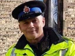 Mourners brave the rain to say goodbye to popular Wigan police community  support officer