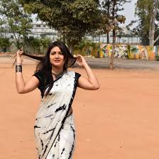 Priyanka nalkar looks beautiful in red with black dotted net lehenga outfit. Priyanka Nalkari