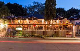 Take the day and walk the cobblestone streets bopping in and out of the countless locally owned small shops and businesses like fair trade winds. Side Street Cafe