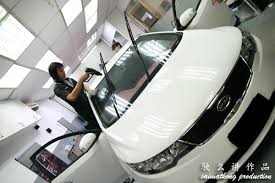 A jpj officer uses a device to check the vlt rate on the rear window of a vehicle. Which Tinting To Choose Raytech 3m Vkool Llumar Ecotint Aircool I M Saimatkong