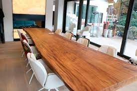 A festive snowflake motif is etched around the side of each piece, while its circular bottom is perfect for adding a soft tea light for added ambiance. Contemporary Dining Table Suar Wood Unik Walnut Solid Wood Lacquered Wood
