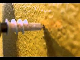 A spiral anchor is the easiest to install: How To Use Drywall Anchors To Hang A Picture Youtube