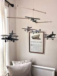Military Airplane Nursery Mobile W Antique Metal Airplanes Etsy Airplane Nursery Airplane Kids Room Vintage Airplane Nursery