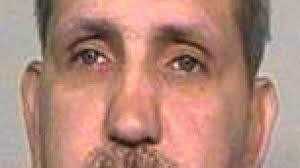 Grandfather videotaped Fargo dentist's home to aid accused murderer,  documents say