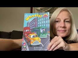 Wheels! by Annie Cobb Illustrated by Davy Jones