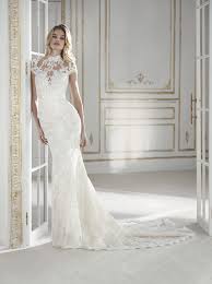 With long lace sleeves, soft beaded flowers and a chapel train are the perfect fairy tale ending to this unique, comfortable gown. La Sposa Bridal 2018 Off 74 Buy