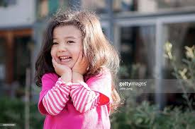 smiling girl in pink shirt with hands on chin picture id498543439 1024 683 pink shirt smile girl cute kids