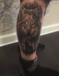 50 Amazing Calf Tattoos Cuded Calf Tattoo Wolf Tattoos Tattoos For Guys