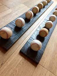 Instead Of Throwing Your Hats In The Corner Of The Coat Closet Or Losing Them To A Top Shelf In Any Or Every R Baseball Hat Racks Diy Hat Rack Baseball