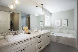 Bathroom illumination design with inexpensive vanity lighting and other bathroom lighting fixtures should also take mirrors into account. The Pendant Lights Over Bathroom Sink Bathroom Pendant Bathroom Pendant Lighting New Bathroom Designs