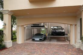 Turn A Two Car Garage Into A Four Car Garage With Hydraulic Lifts To Maximize Space Modern Garage Garage Design Garage House Plans