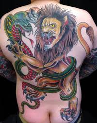 Maybe you would like to learn more about one of these? Snake Back Lion Tattoo By Captured Tattoo