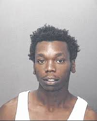 One of three charged with murder and robbery arrested