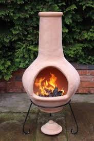Add an outdoor fire pit that stands out from the rest with this black steel chiminea. 38 Clay Chiminea And Fire Pit Ideas Chiminea Fire Pit Clay Chiminea