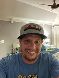 Meat Church hat at church with pastor's scripture passage