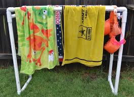 For about $20 in parts, we have a large clothes drying rack that hangs on our rear ladder when needed, and folds apart for easy storage. 11 Camper Ideas Camper Rv Stuff Clothes Drying Racks