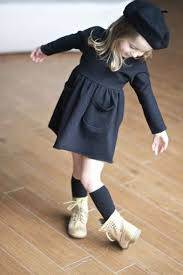 A Black Long Sleeve Dress A Black Beret Black Socks And White Leather Boots Kids Outfits Girl Outfits Toddler Fashion