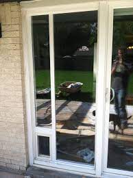 Hidden cat door in panel door. Dog Door Installation Sliding Glass Door Sliding Glass Dog Door Sliding Glass Door Pet Door Sliding Glass Door