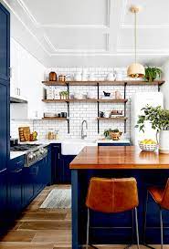 The baskets have ample space for ingredients, crockery and cookware, while the pull out bin keeps trash out of sight. 23 Farmhouse Kitchen Ideas For A Perfectly Cozy Cooking Space Kitchen Design Home Decor Kitchen Farmhouse Kitchen Design