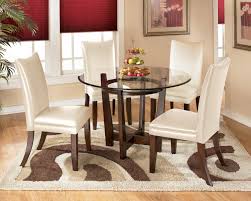 Ashley furniture kitchen table sets. Red Charrell 5 Piece Dining Room Table Set Includes Round Glass Table 4 Upholstered Chairs Ashley Furniture Signature Design Office Furniture Accessories Office Products Guardebem Com