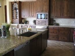Knotty Alder Cabinets With White Subway Tile Backsplash Kitchen Flooring Alder Kitchen Cabinets Home Kitchens