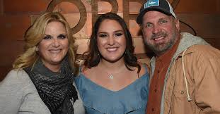 A garth is an enclosed quadrangle or yard, especially one surrounded by a cloister (middle english; Garth Brooks Spends His Birthday With His Daughters And Granddaughters Rare Country