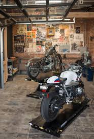 Bmw Motorrad And The House Of Machines Open Motorcycle Minster In La Motorcycle Garage Garage Design Garage Style